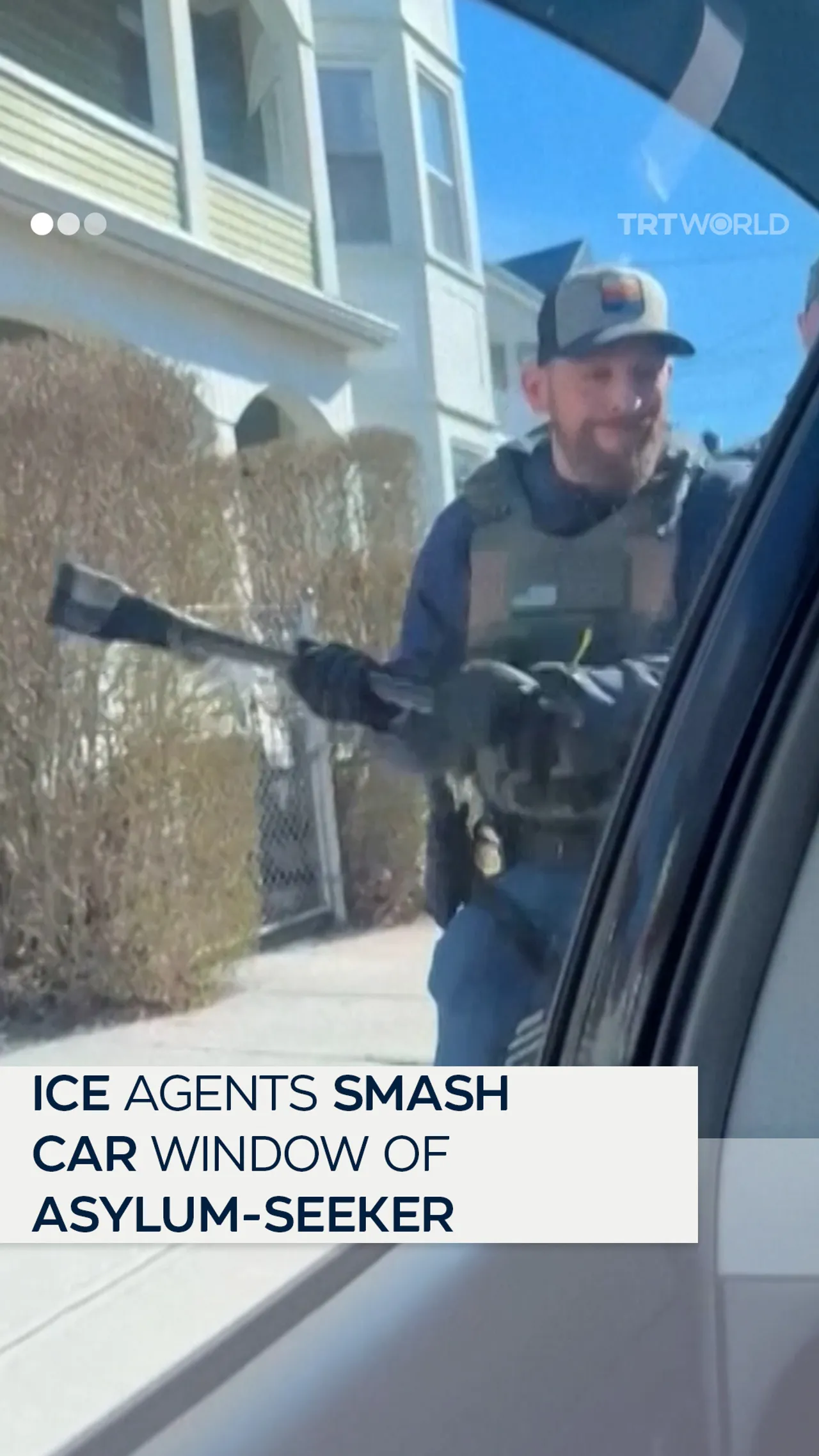 ICE agents smash car window of asylum-seeker